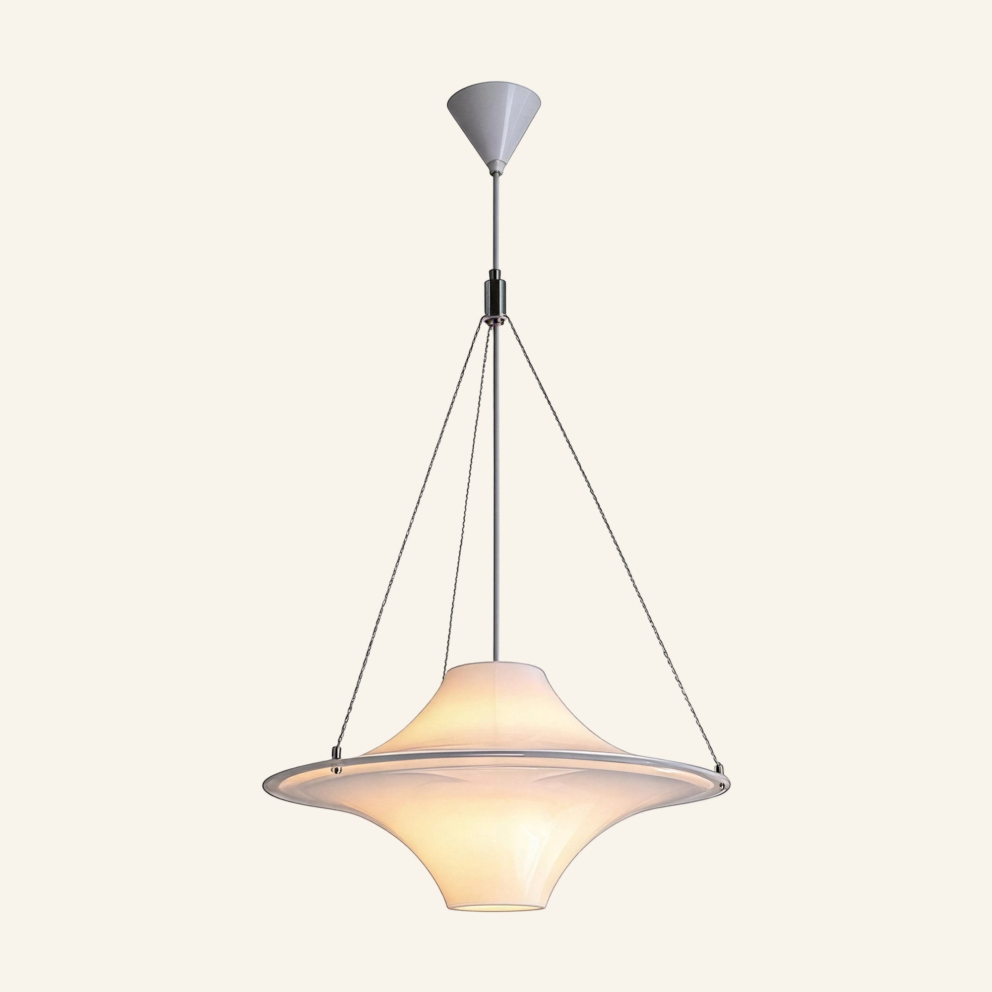 Opal glass UFO pendant lamp with saucer brim, tapered dome and downward cone suspended on four steel cables against cream backdrop