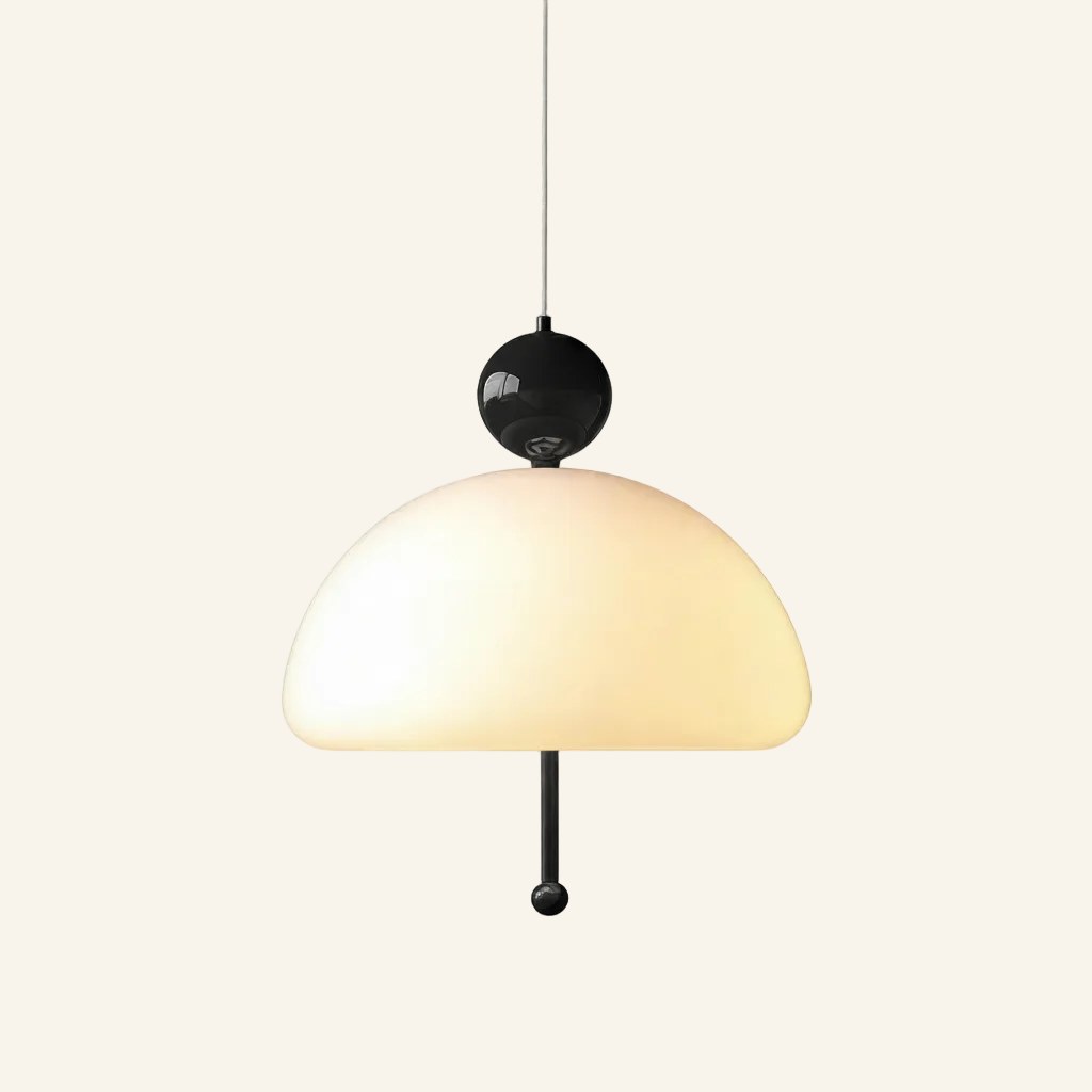 Front view of opal glass pendant lamp in a black colourway, dark ball cap and pull cord contrasting the soft white shade