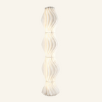 Tiered White Floor Lamp with Sculptural Skirt Shade