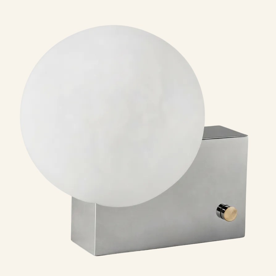 Frosted opal glass globe shade on a polished chrome rectangular block base with side-mounted brass rotary dimmer knob.