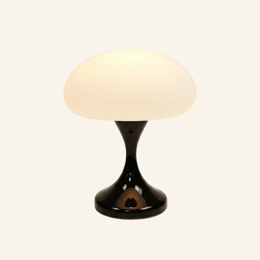 Glossy black lacquered tulip base topped by an illuminated frosted glass mushroom shade, compact night light for bedside use